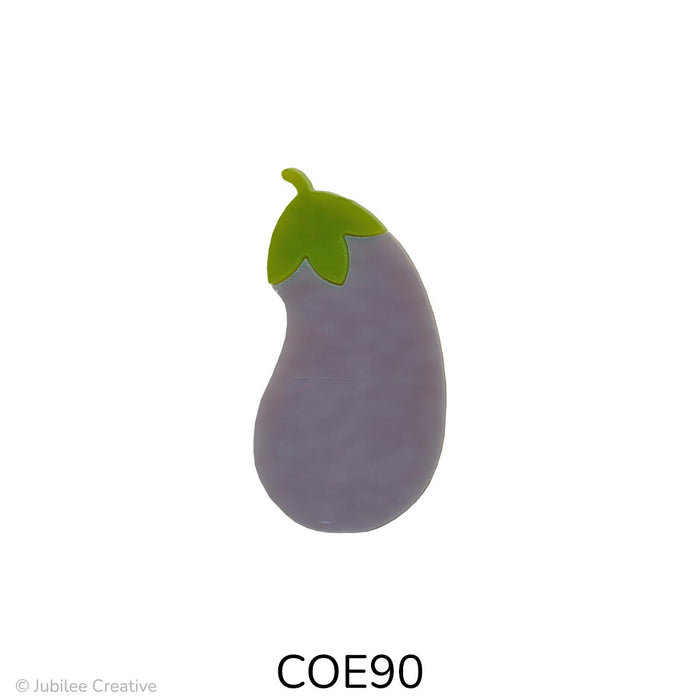 Image shows a stylized glass eggplant with a curved, oblong shape. The body is purple or blue-purple with a green leafy cap and a small stem at the top. COE90
