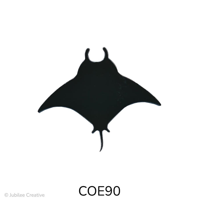 image of a COE90 fusible black glass manta ray.