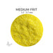 Close-up of Bullseye Canary Yellow Opalescent 000120 Medium Frit showing 1.2 to 2.7 mm particles.