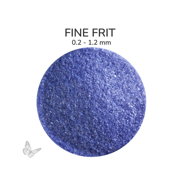 Close-up of Bullseye Cobalt Blue Opalescent 000114 Fine Frit showing 0.2 to 1.2 mm particles.