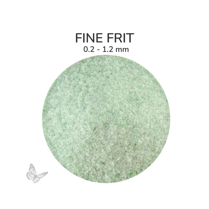 Close-up of Bullseye Green White Opalescent 002112 Fine Frit showing 0.2 to 1.2 mm particles.