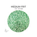 Close-up of Bullseye Green White Opalescent 002112 Medium Frit showing 1.2 to 2.7 mm particles.