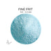 Close-up of Bullseye Light Cyan Opalescent 000216 Fine Frit showing 0.2 to 1.2 mm particles.
