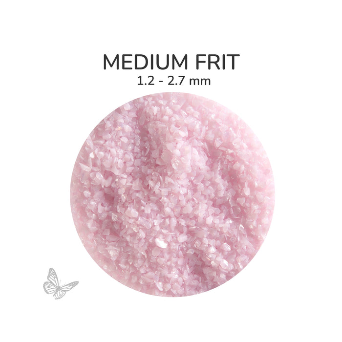 Close-up of Bullseye Petal Pink Opalescent 000421 Medium Frit showing 1.2 to 2.7 mm particles.