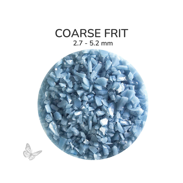 Close-up of Bullseye Powder Blue Opalescent 000108 Coarse Frit showing 2.7 to 5.2 mm particles.