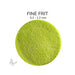 Close-up of Bullseye Spring Green Opalescent 000126 Fine Frit showing 0.2 to 1.2 mm particles.