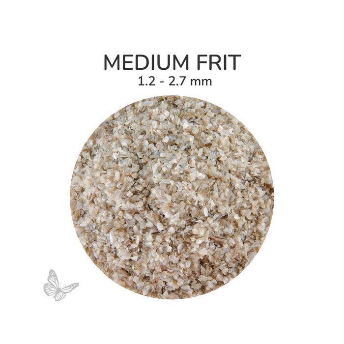 Close-up of Bullseye White Brown Mix Opalescent 002109 Medium Frit showing 1.2 to 2.7 mm particles.