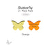 Bullseye orange butterfly glass shape shown before firing alongside its bright orange fired color result.