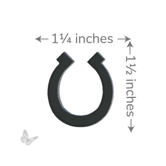 Black horseshoe-shaped fusible glass cutout with dimensions labeled approximately 1¼ inches wide by 1½ inches tall.
