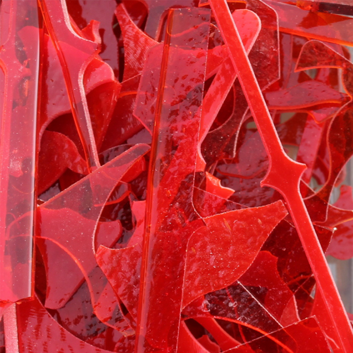 images of red pieces of waterjet cut scrap glass -COE90