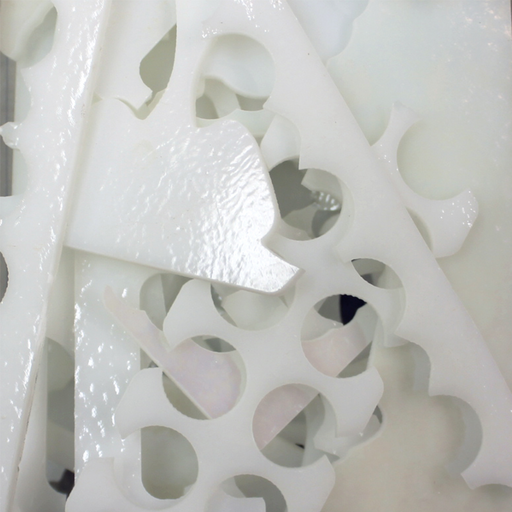 images of white pieces of waterjet cut scrap glass -COE90