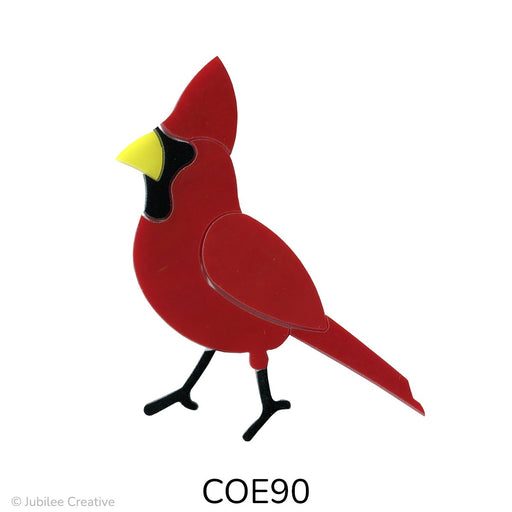 image of a fusible precut opaque red glass cardinal bird with a yellow beak and black face and legs - COE90