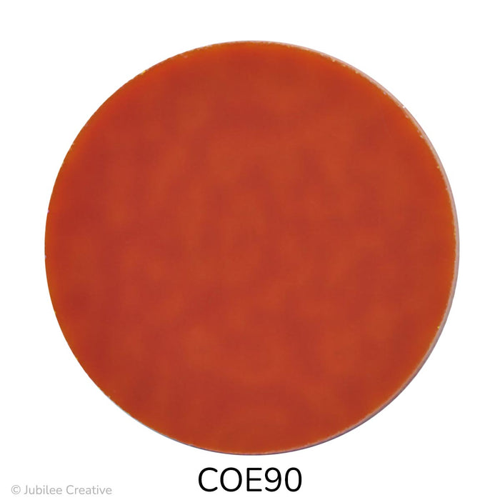 image of a fusible precut opaque burnt orange glass circle - COE90