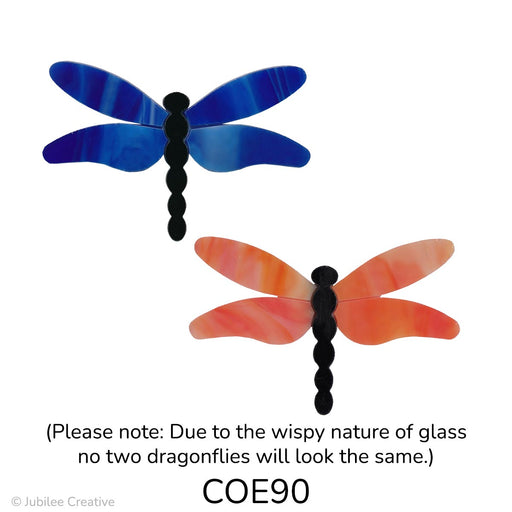 image of a two precut glass dragonflies with a black body and wings in wispy blue or wispy orange - COE90