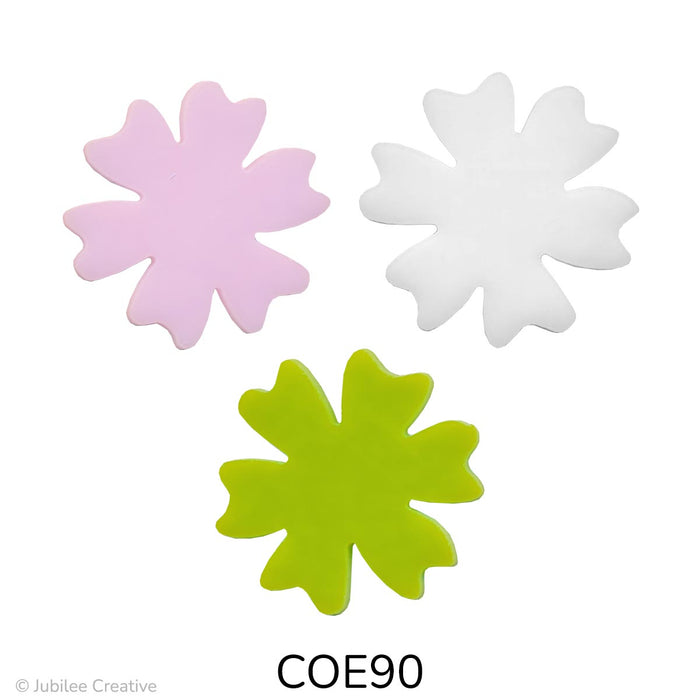 image of a fusible precut glass flower with six petals in an opaque pink, green, and white colors - COE90