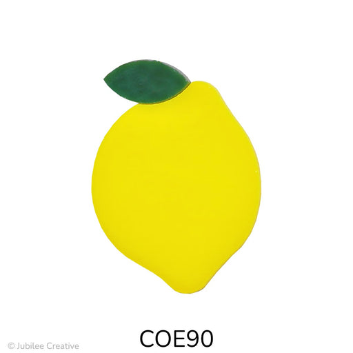 image of a fusible precut yellow glass lemon with a dark green leaf - COE90