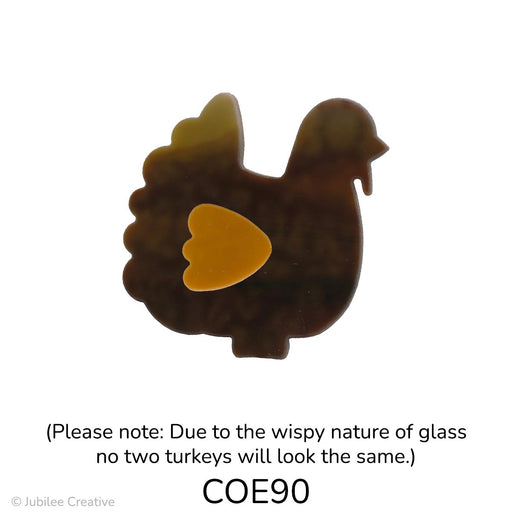 image of a fusible precut streaky brown glass turkey that features a butterscotch brown wing on top - COE90