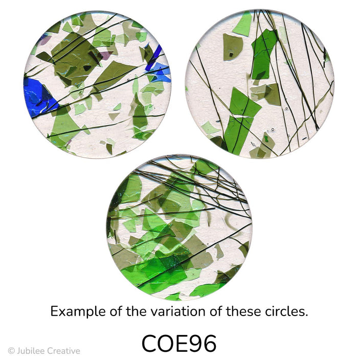 Three circular glass circles with green and blue abstract patterns on a white background, labeled COE96.