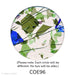 Image of a 3 inch glass circle made from blue, green, purple glass confetti with black stringers on clear - COE96