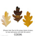Image shows three glass oak leaves in autumn shades. Each leaf has a classic lobed shape and varies in color, including creamy beige, golden amber, and rich brown swirls.