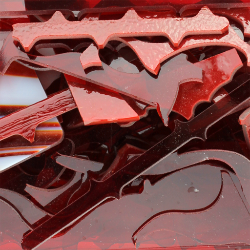 images of red pieces of waterjet cut scrap glass -COE96