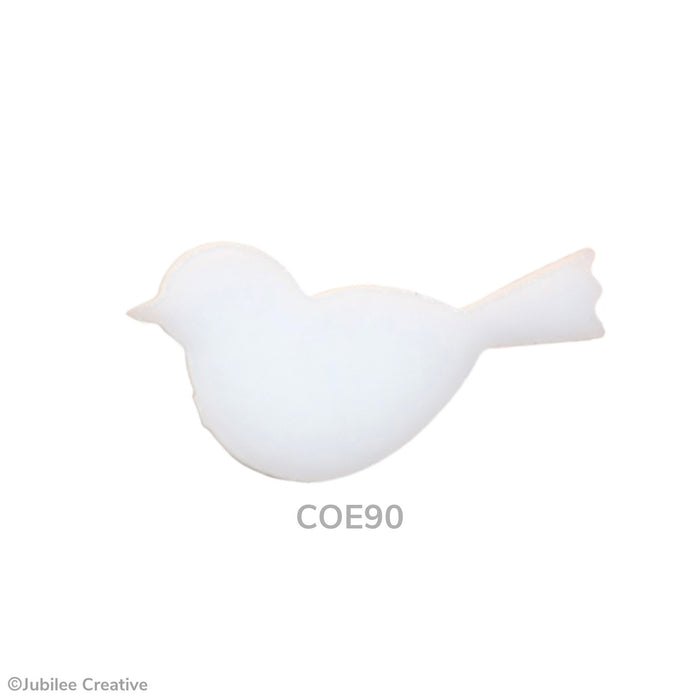 COE90 fusible precut glass bird in the color opaque white.