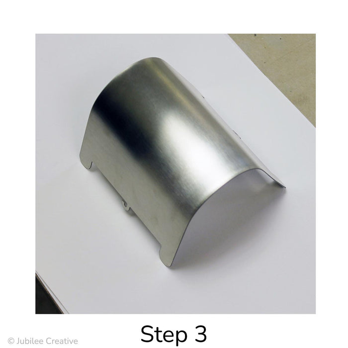 Image of Step 3. Check the balance to make sure the feet are all well-aligned and evenly planted on your work surface. Adjust by squaring up the mold again and re-working the curve.