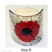 image of Step 8. A finished candle holder with a red poppy on a clear and black background.