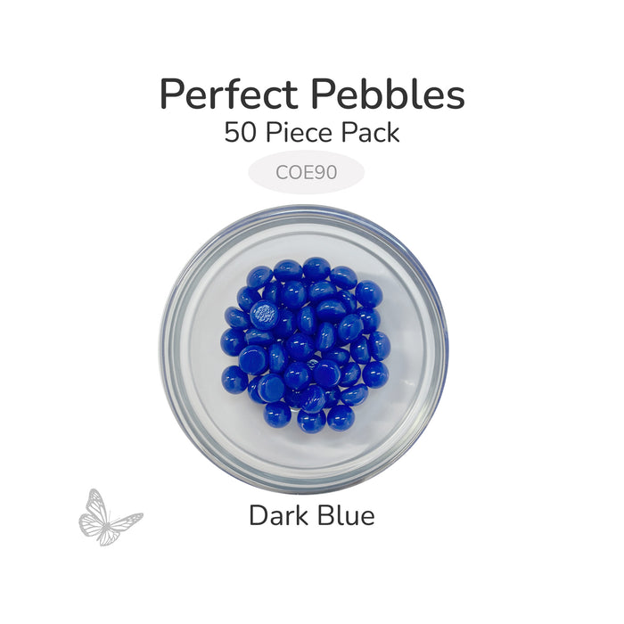 50 round dark blue glass pebbles in a clear dish labeled Perfect Pebbles 50 Piece Pack COE90