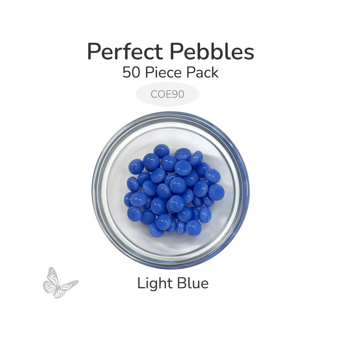 50 round light blue glass pebbles in a clear dish labeled Perfect Pebbles 50 Piece Pack COE90