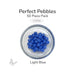50 round light blue glass pebbles in a clear dish labeled Perfect Pebbles 50 Piece Pack COE90