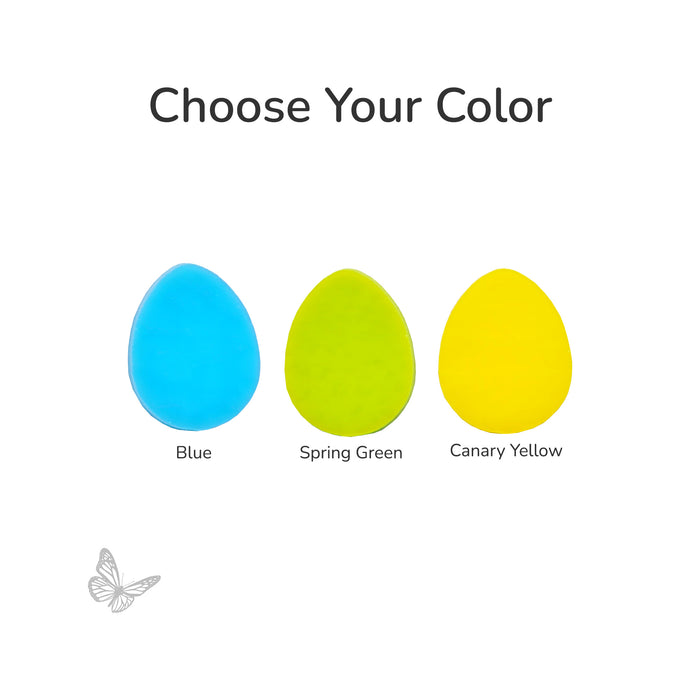 Three egg-shaped precut fusible glass pieces in blue, spring green, and canary yellow on a white background.