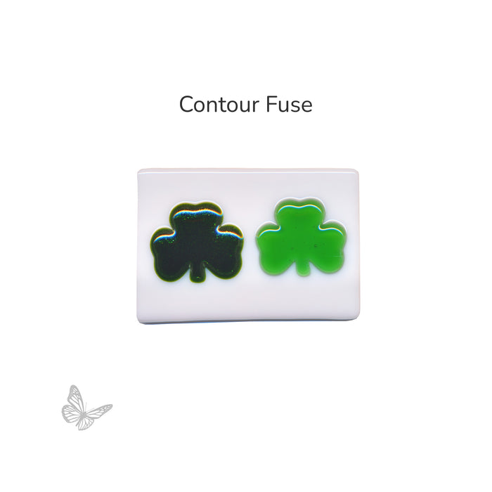 Bullseye COE90 shamrock glass shapes shown after contour fuse on white glass