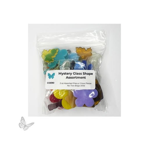 Packaged mystery glass shape assortment with colorful glass pieces and a label on a white background. COE90