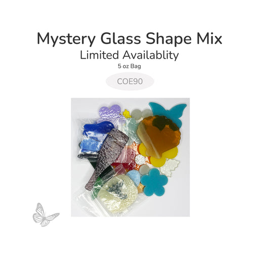 Mystery glass shape mix with various colored glass pieces in a clear bag on a white background. COE90