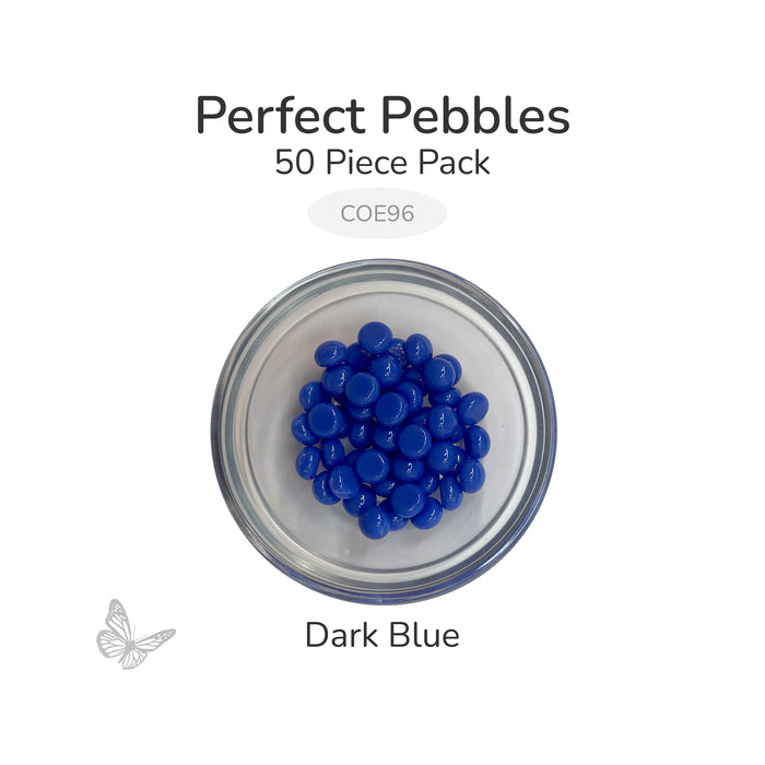 50 round dark blue glass pebbles in a clear dish labeled Perfect Pebbles 50 Piece Pack COE96