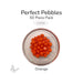 50 round orange glass pebbles in a clear dish labeled Perfect Pebbles 50 Piece Pack COE96