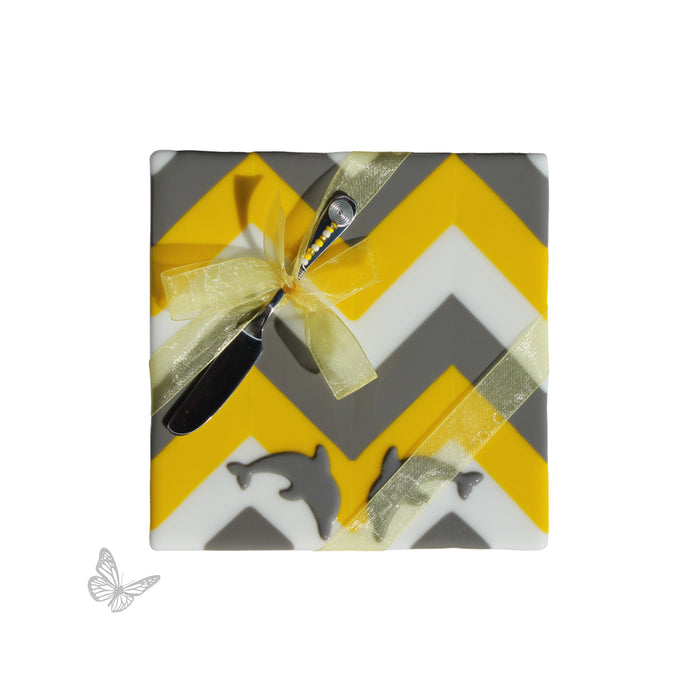 Fused glass cheese plate featuring Bullseye COE90 dolphin shapes embedded in a geometric design