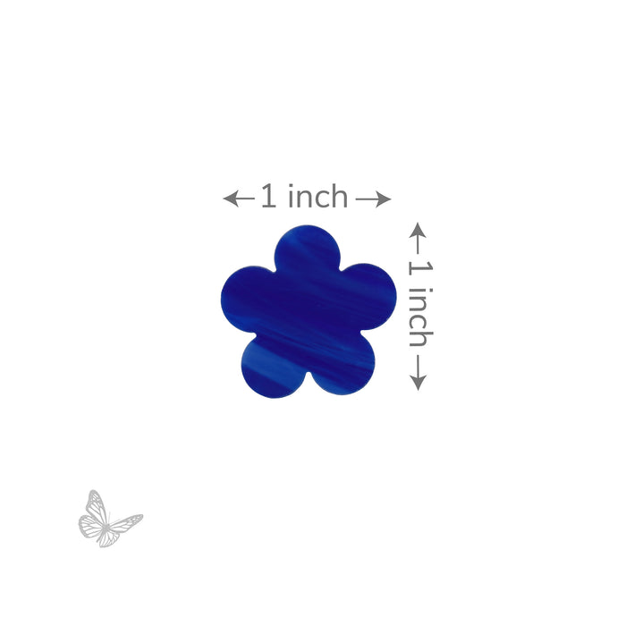 Blue precut glass flower-shaped object with '1 inch' markings on a white background