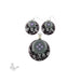 Example of finished fused glass jewelry using layered glass circles, shown as earrings and pendant.